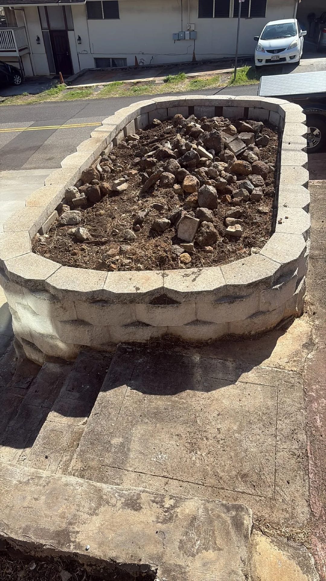 Finished rounded segmental block planter wall, Honolulu residence